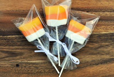 Candy corn dipped marshmallow pops by Food Family Finds