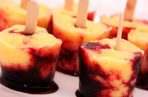 Mango blackberry yogurt popsicles by Giver's Log