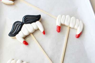 Vampire cookies on a stick by Sweet Sugarbelle