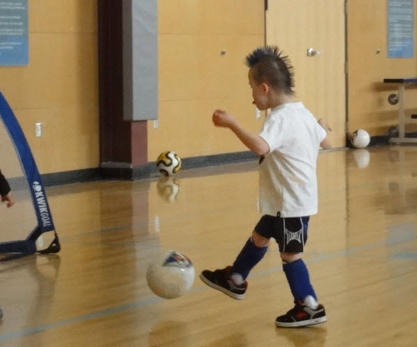 Alexi playing soccer
