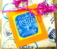 Menorah gift wrap for Hanukkah by Creative Jewish Mom