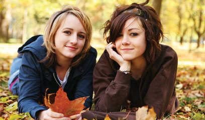 happy teenage girls in the fall outside