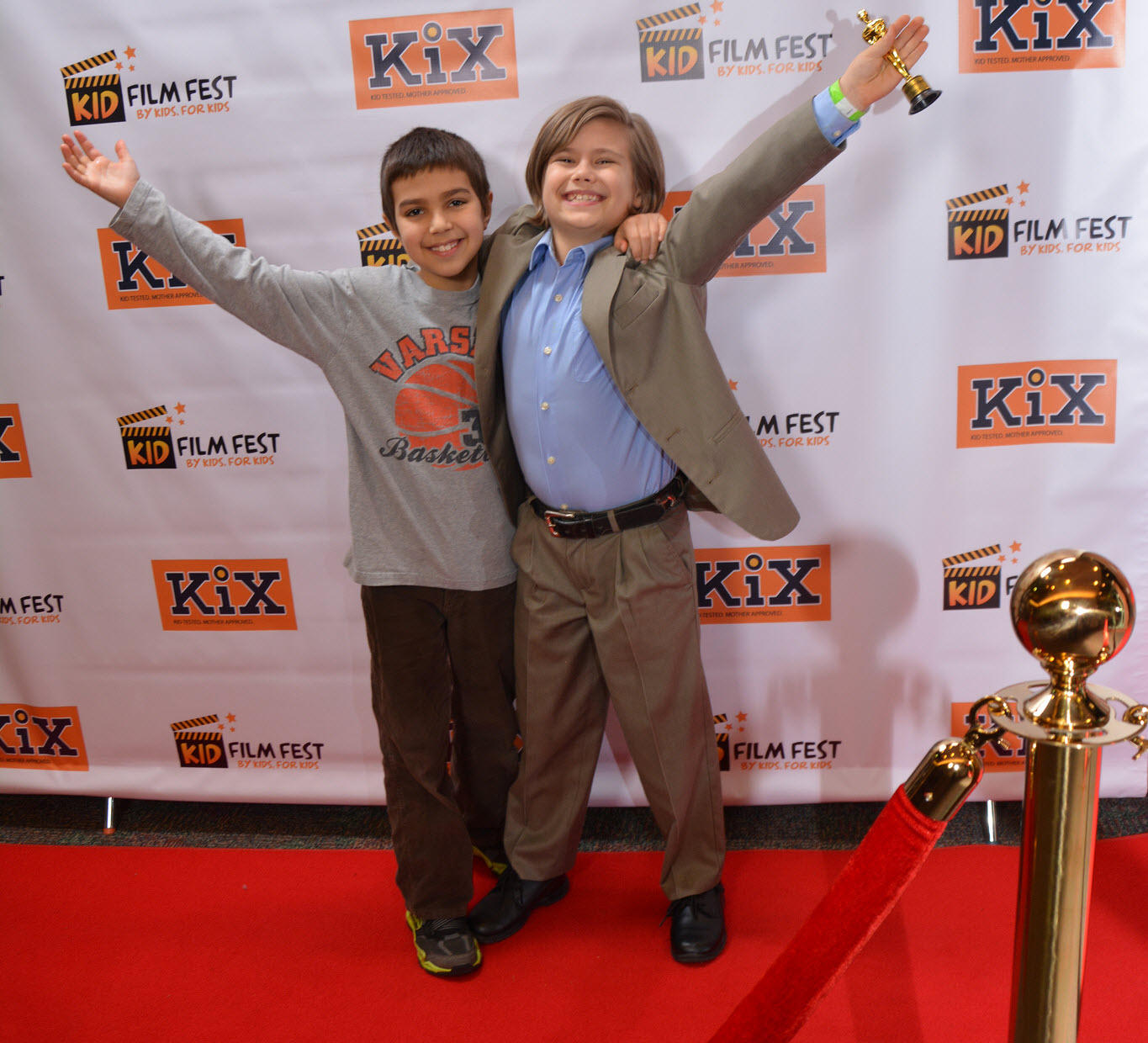 Two young filmmakers celebrating at last year's Kid Film Fest