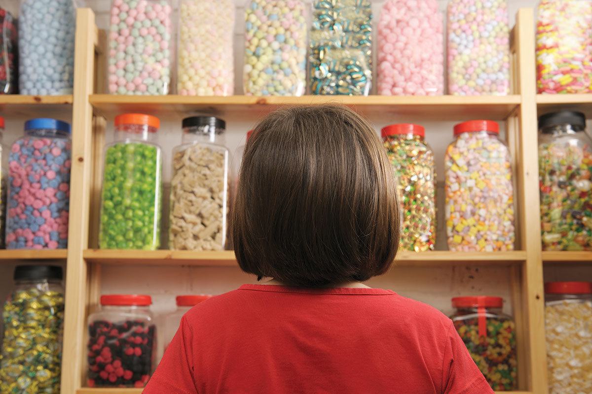 girl in candy store