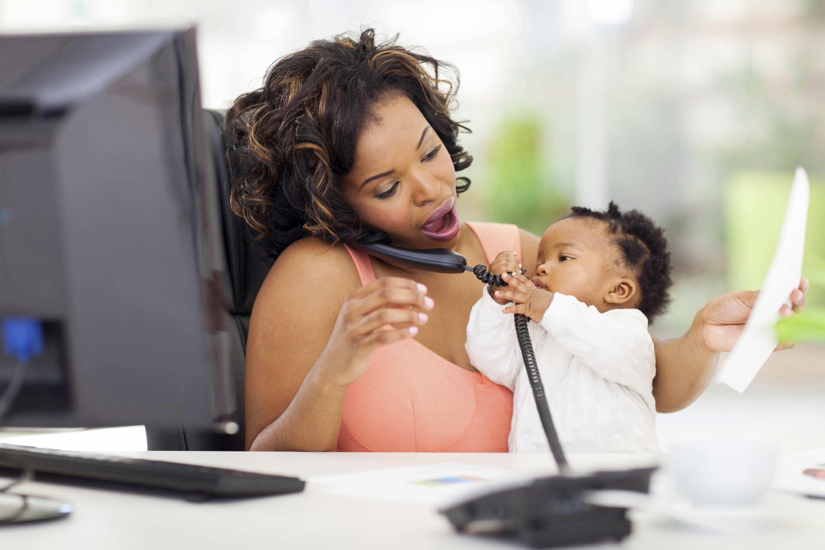 busy businesswoman with baby