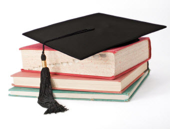 graduate cap and books