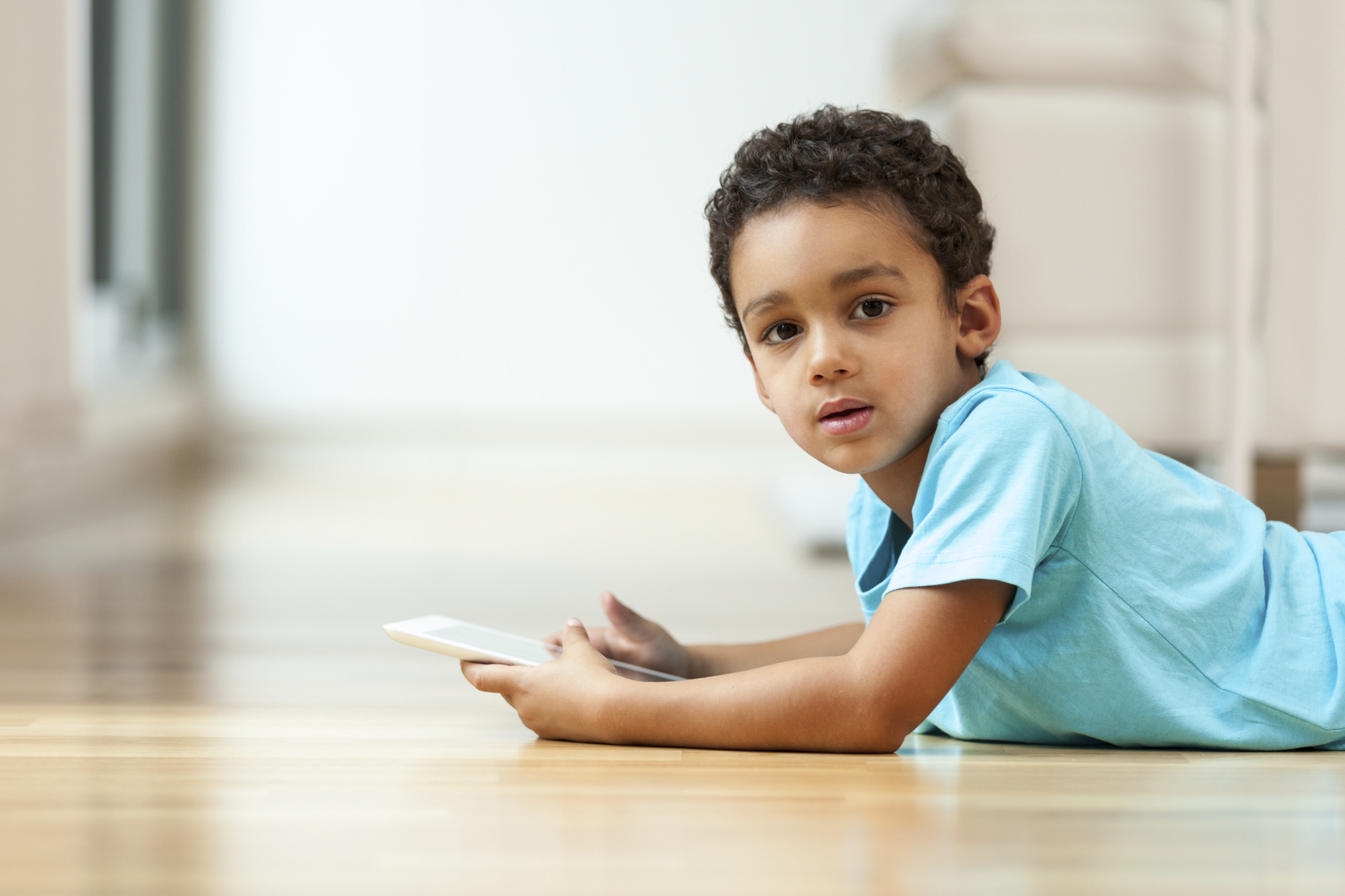 boy on internet tablet