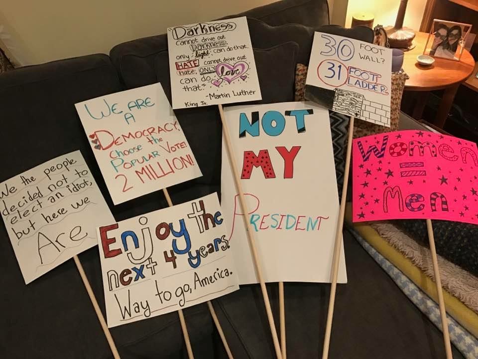 Protest signs made by Natalie Singer-Velush and friends