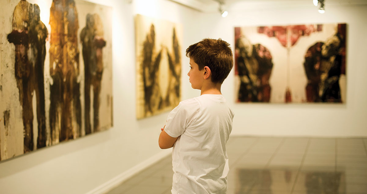 boy in art gallery