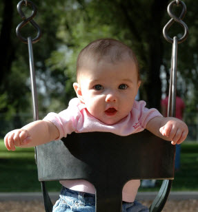 8 month old baby in swing