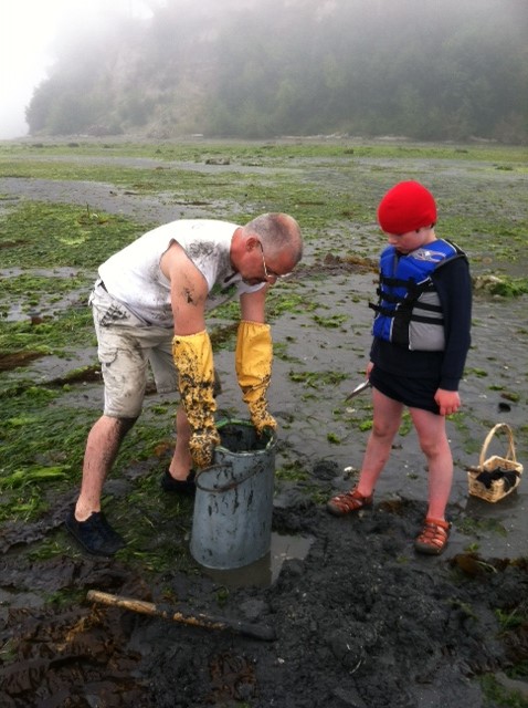 James Mize and son digging geoducks family clamming trips