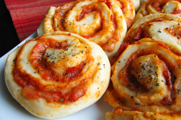 Super Bowl Snack: homemade pizza rolls by Stick A Fork In It
