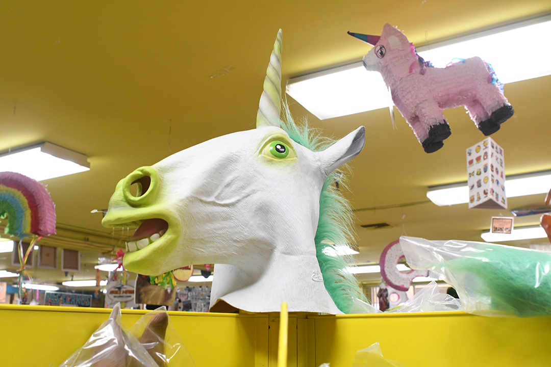 Archie McPhee glow-in-the-dark unicorn mask covers your whole head and is a showstopper at parties
