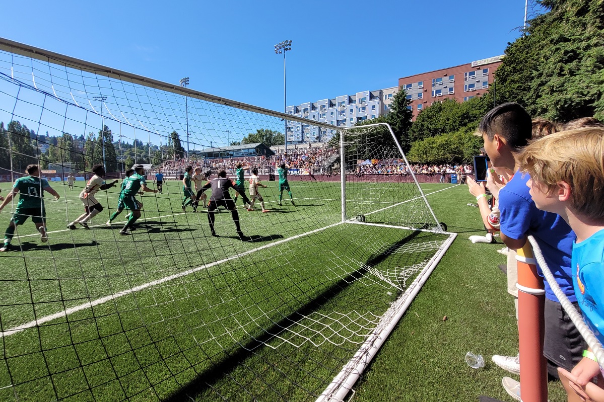 Young fans get super close to the action during a 2022 Ballard FC match in Seattle