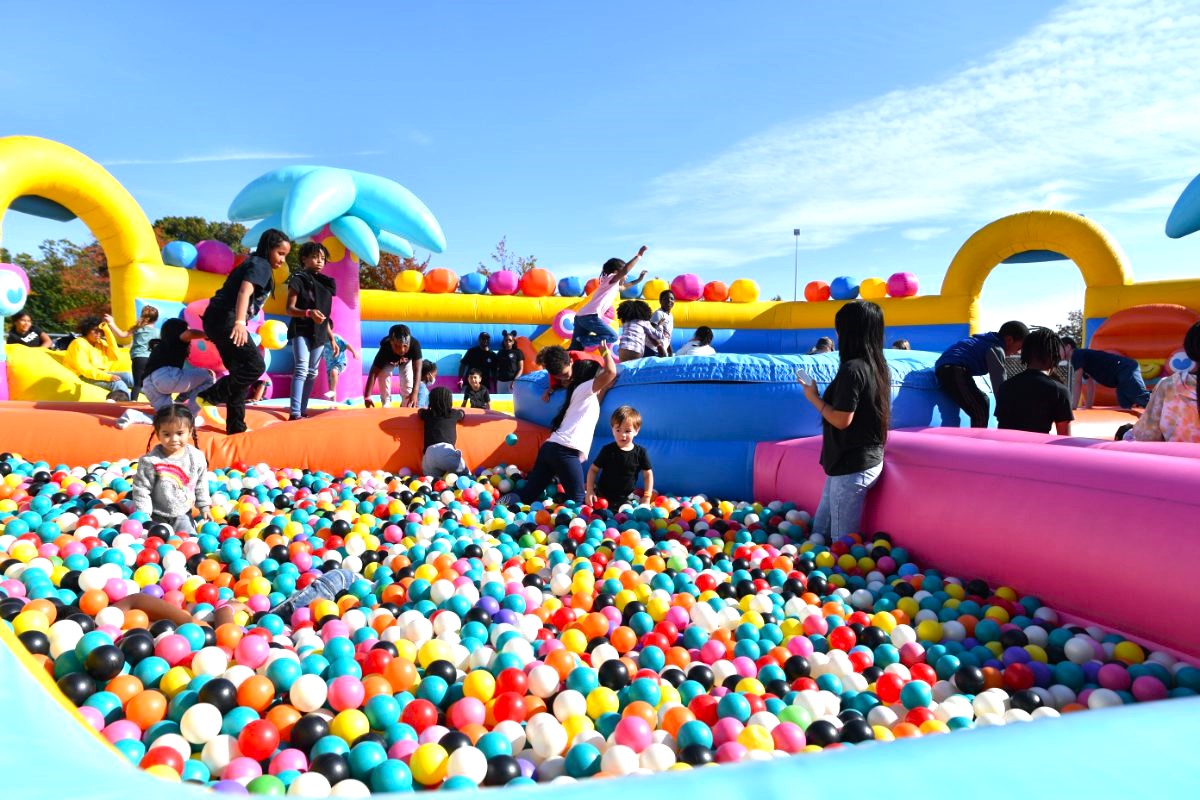 Bounce The City Seattle ball pit with people jumping and playing