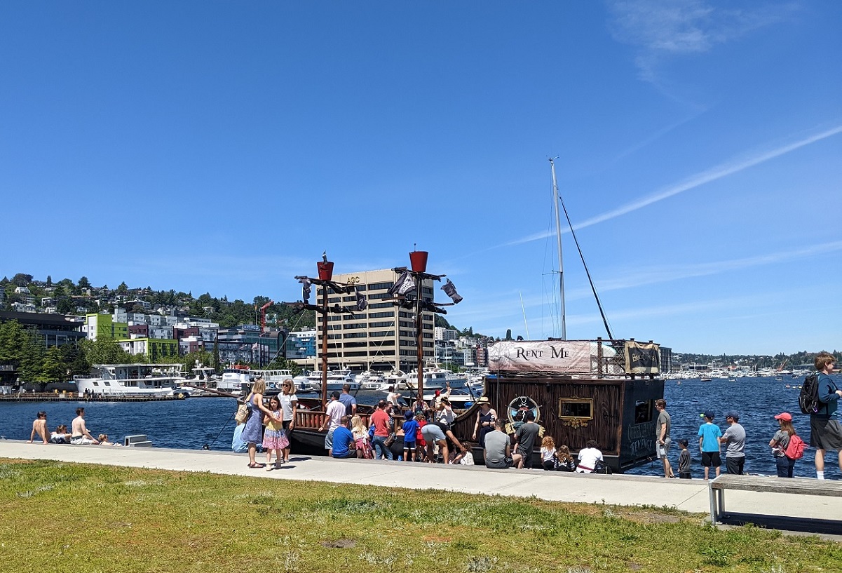 Families wait at Lake Union Park to board Queen Anne’s Revenge, the Emerald City Pirates’ pirate ship for the Family Treasure Cruise