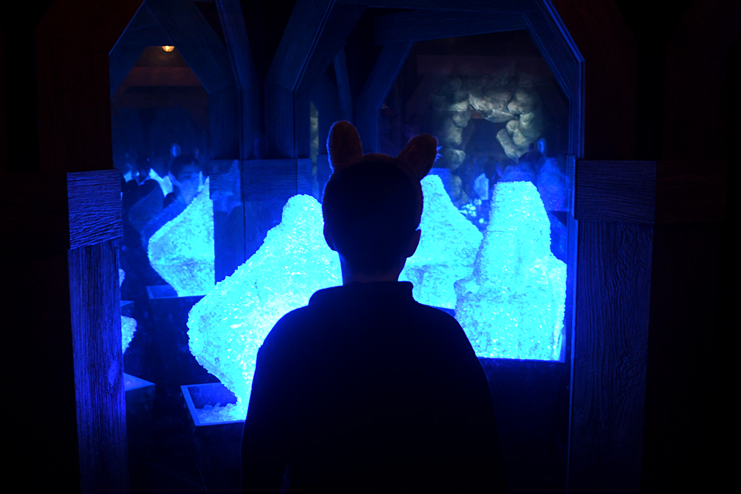 A boy navigates the mirror maze at Great Wolf Lodge near Seattle, among extra activities available to guests