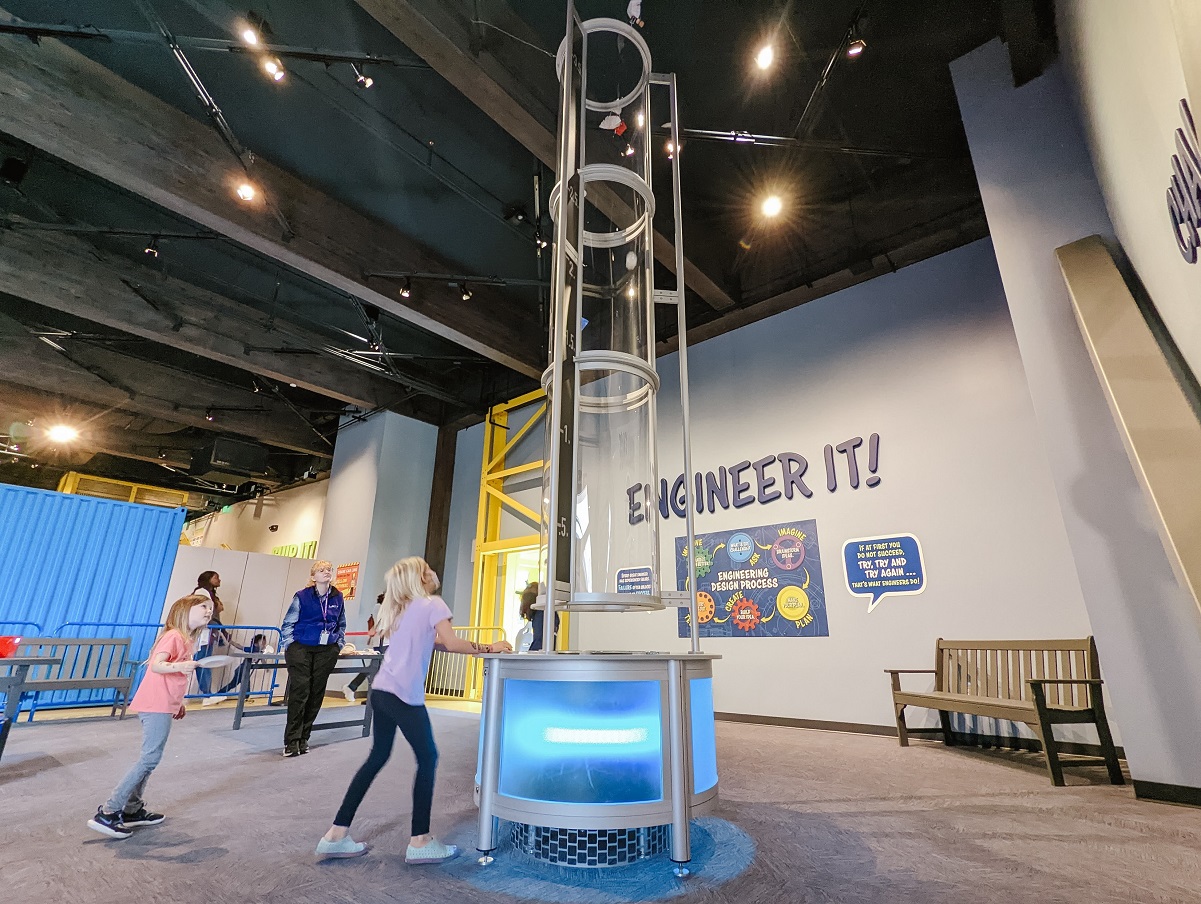 Kids play at the Engineer It! exhibit area at newly expanded Imagine Children's Museum in Everett, Wash.