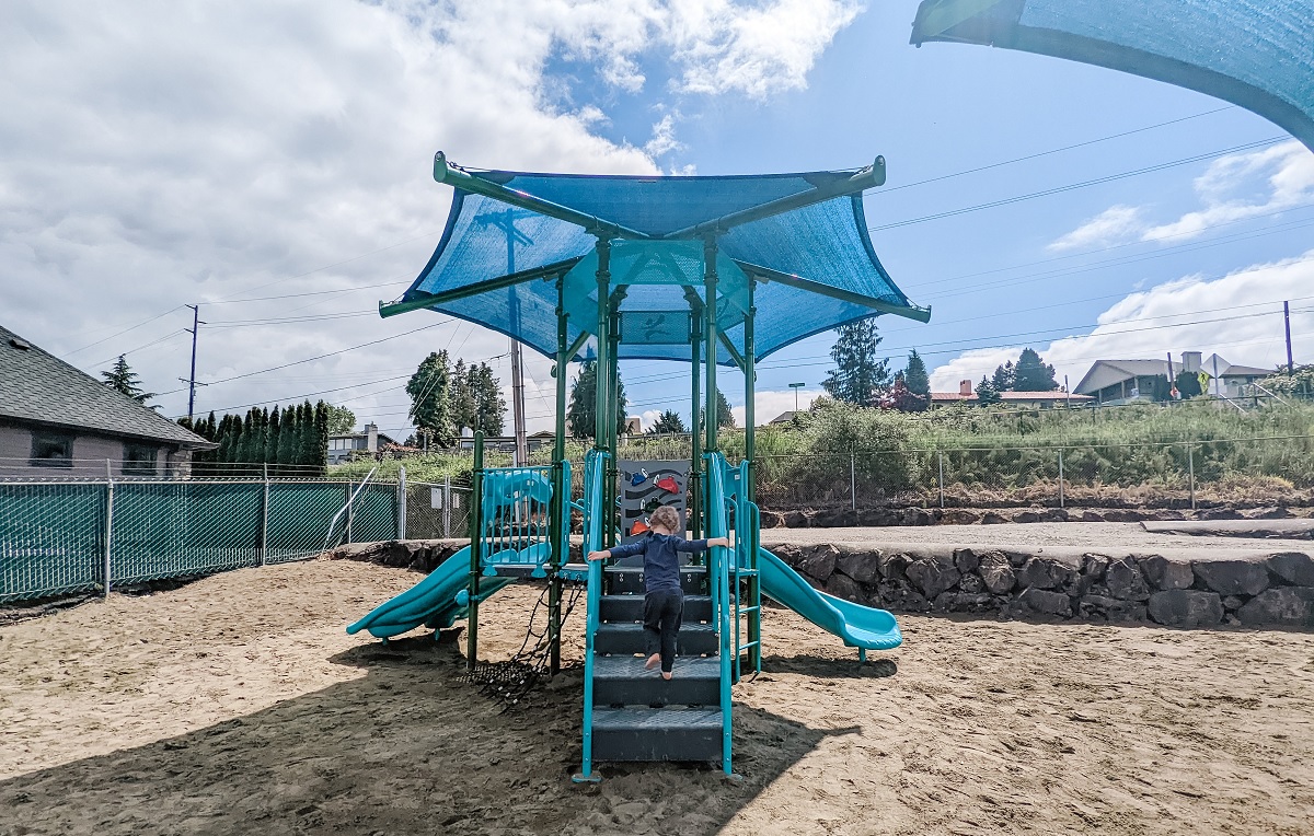 The shaded tot play structure at Renton's Kennydale Beach Park near Seattle new playground equipment spring summer 2022