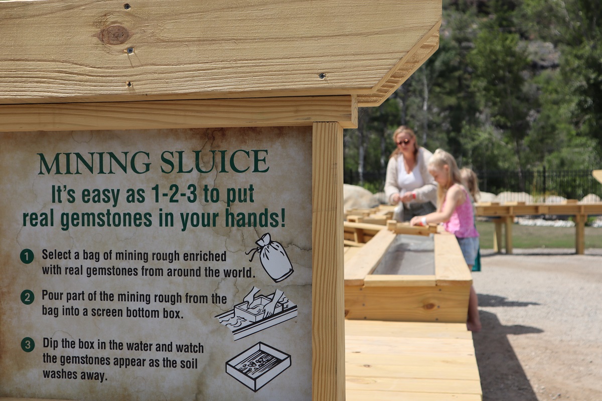 A sign at Leavenworth Adventure Park explains how to do the mining sluice activity