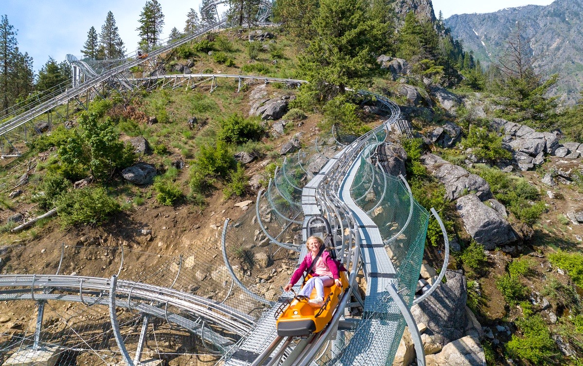 Riders descend the track on the Tumwater Twister Alpine Coaster at Leavenworth Adventure Park