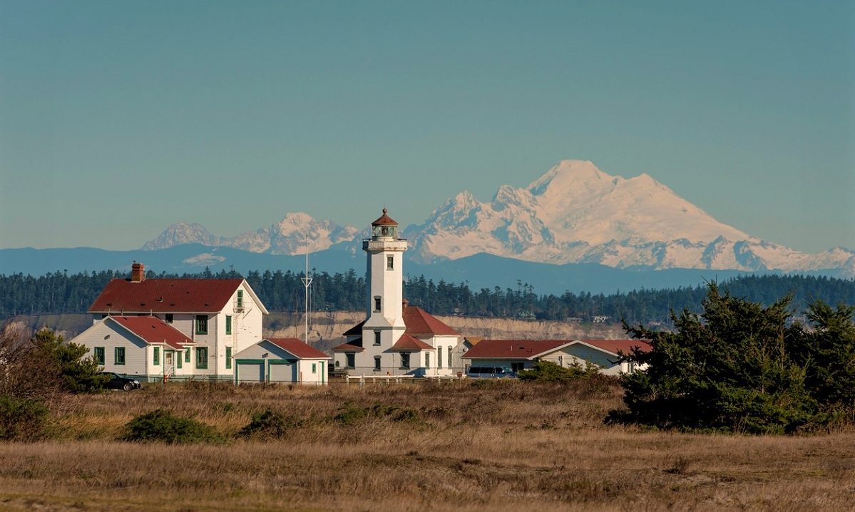 Point Wilson Lighthouse at Fort Worden State Park with Mount Baker in the background