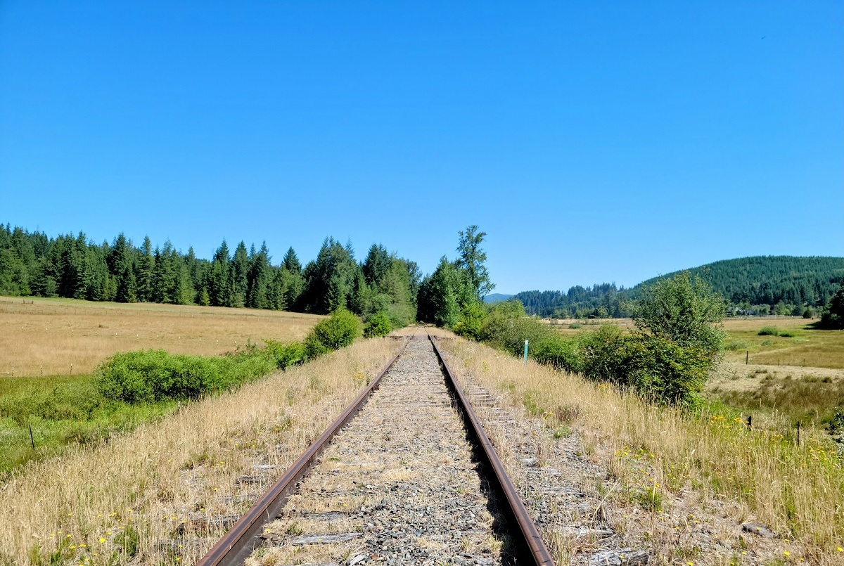 Railroad tracks carry rail cycle riders through pristine landscapes, not easily accessible by road
