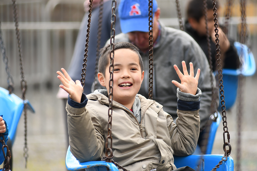 Remlinger Farms visitor Joseph Grygiel is smiling and ready for a ride on the big swing