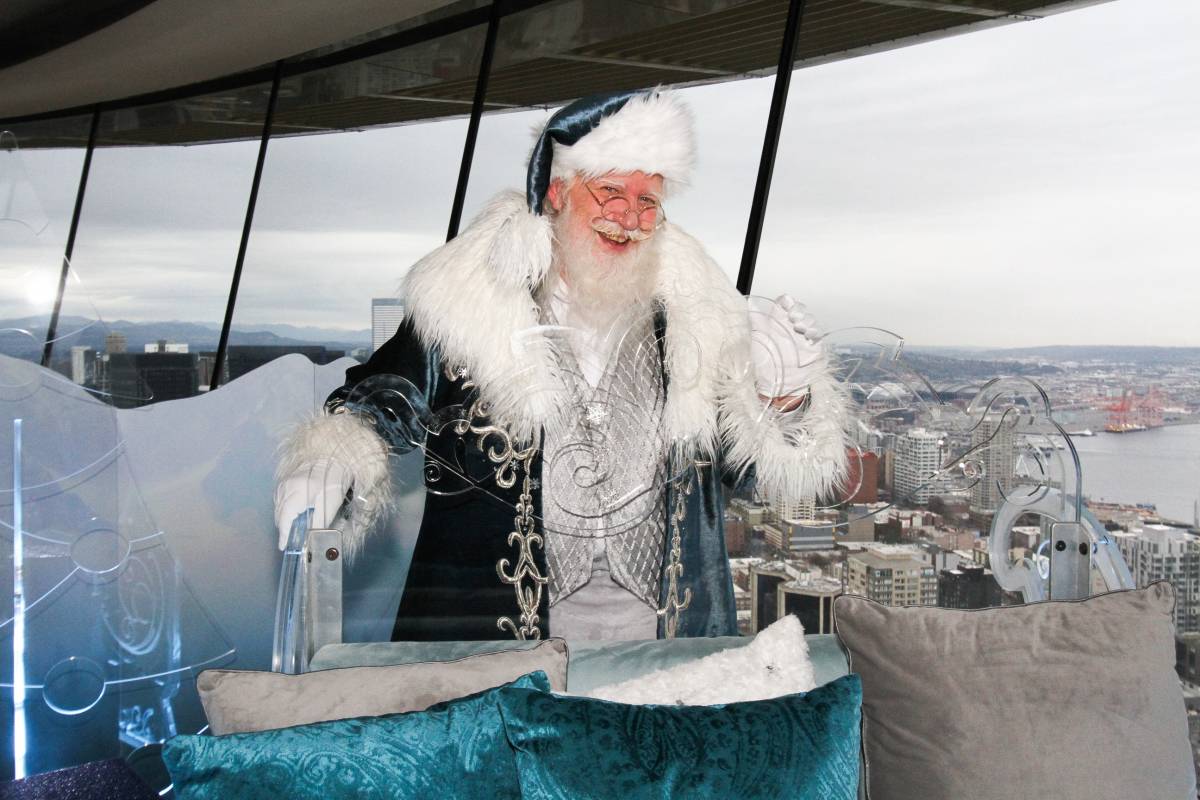 Santa at the top of the Space Needle where to get photos with Santa around Seattle