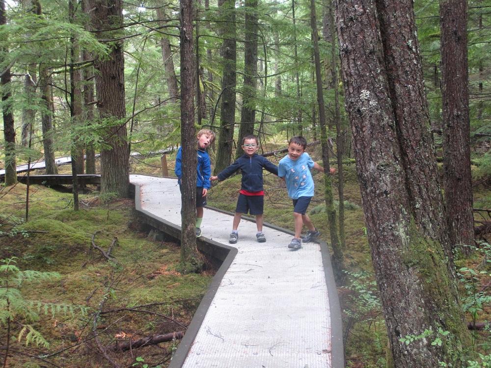 Kids on the boardwalk at Shadow Lake Nature Preserve in Renton, a good place for a boardwalk stroll