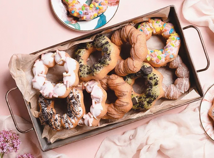"Tray of colorful dochi doughnuts"