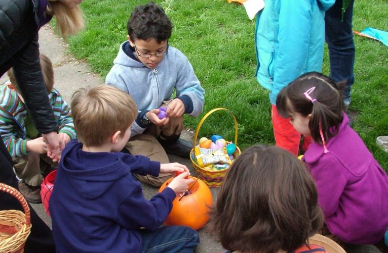 Kids gathering eggs at a Seattle Community Center
