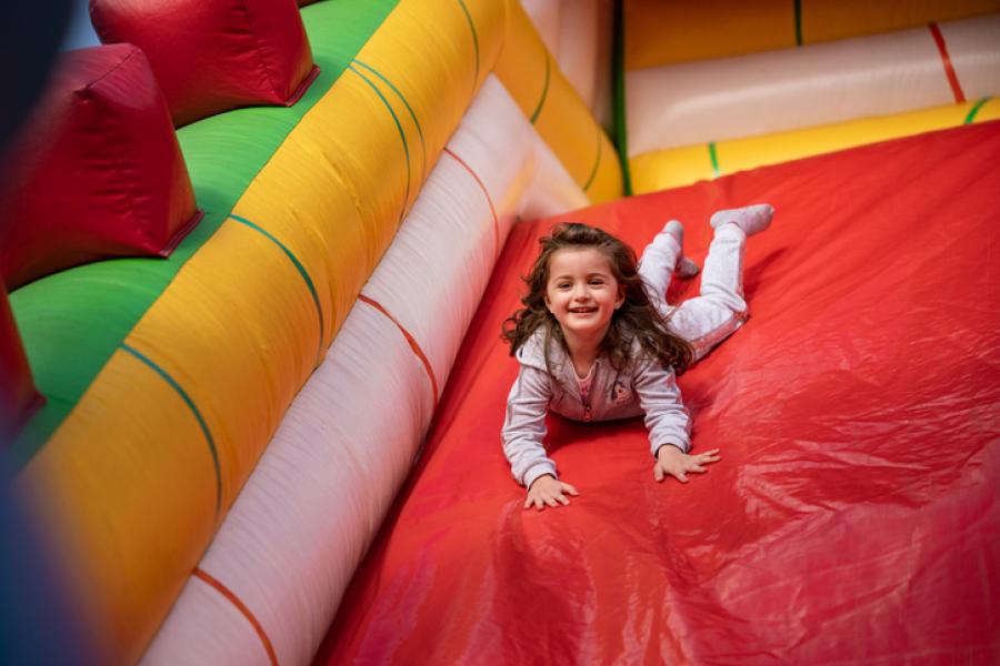 girl on bouncy slide