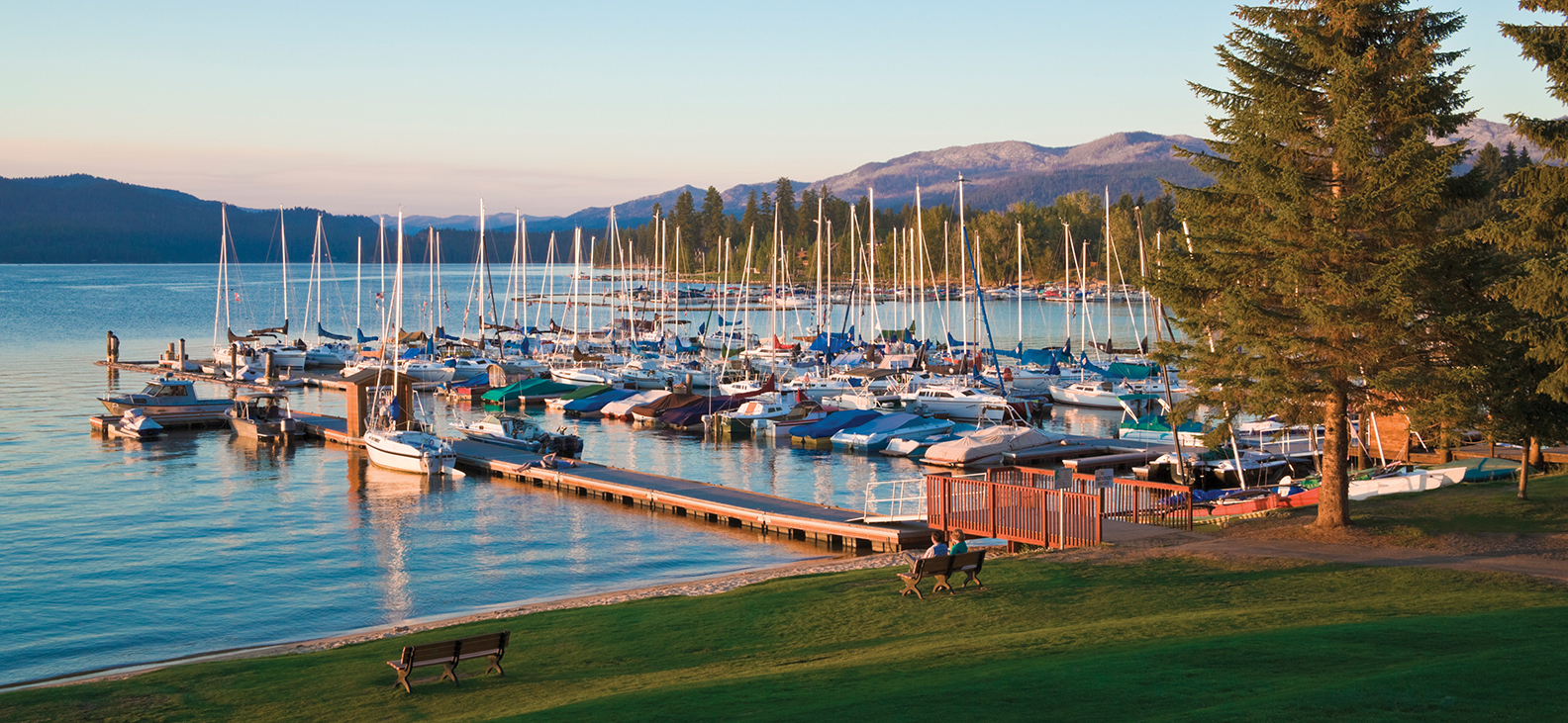 "Payette lake dock with many boats on a sunny day"