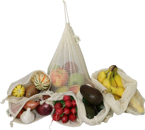 "Cotton produce bags filled with fruits and veggies"