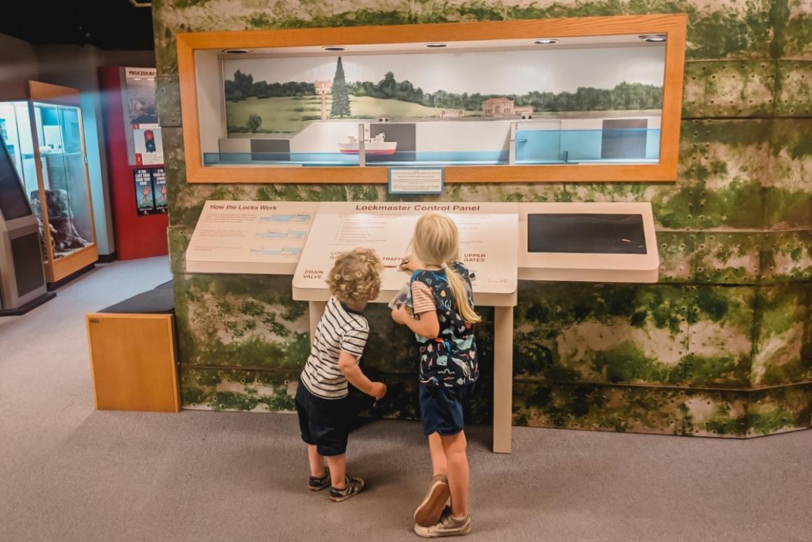Kids looking at display at the Ballard Locks visitor center Seattle