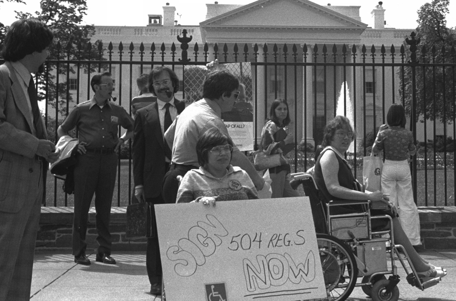 a protest to push lawmakers to sign 504 in front of the White House