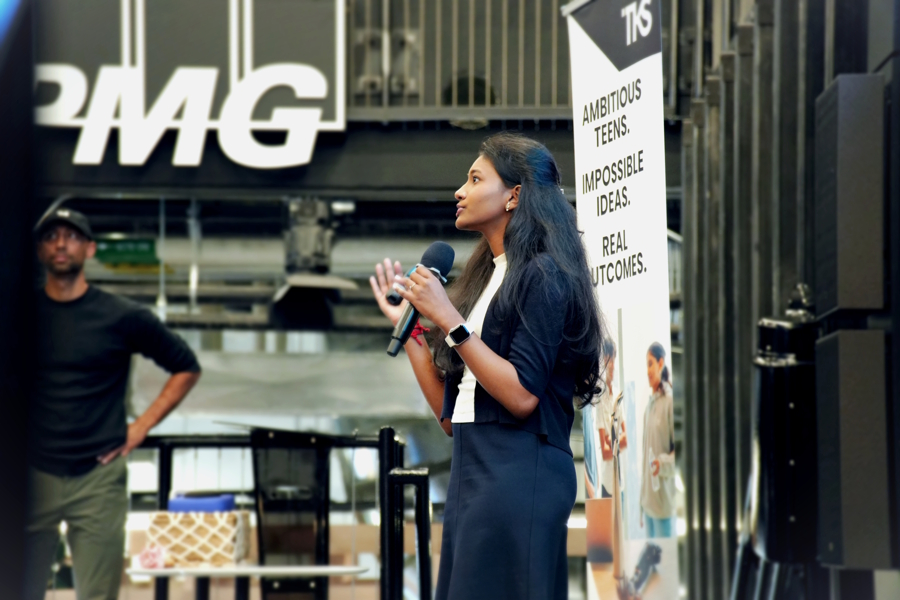 woman talking into a microphone