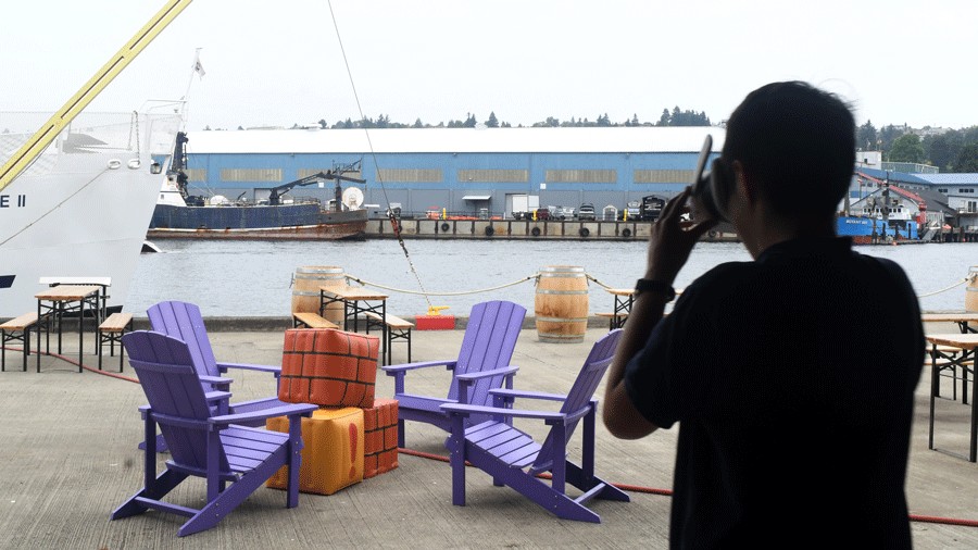 young boy looking out at the back patio of DreamPark Seattle
