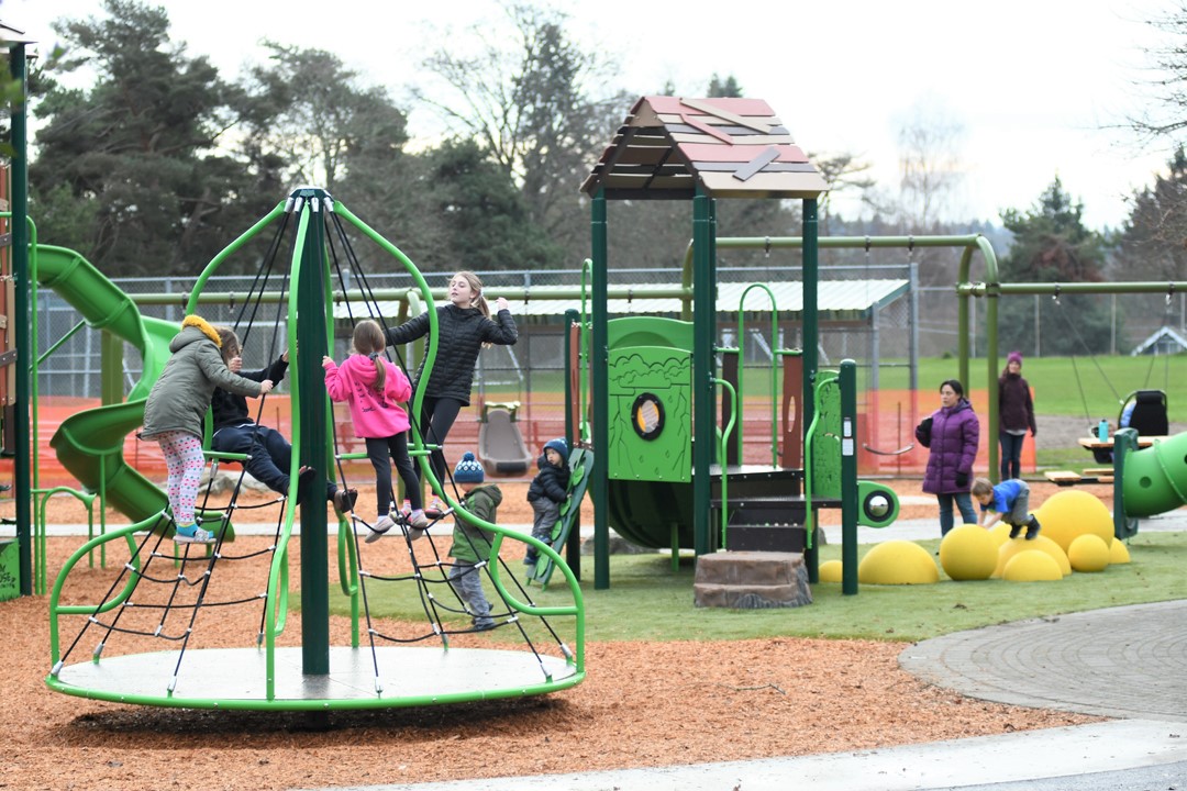 EC-Hughes-new-playground-merry-go-round-seattle-kids-families-west-seattle