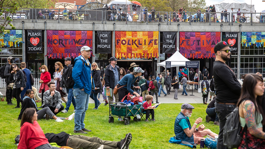 crowds enjoying performances at Northwest Folklife Festival