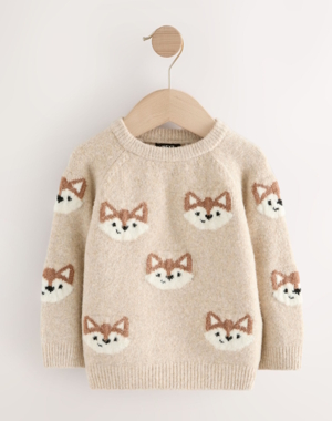 child's sweater with fox heads all over