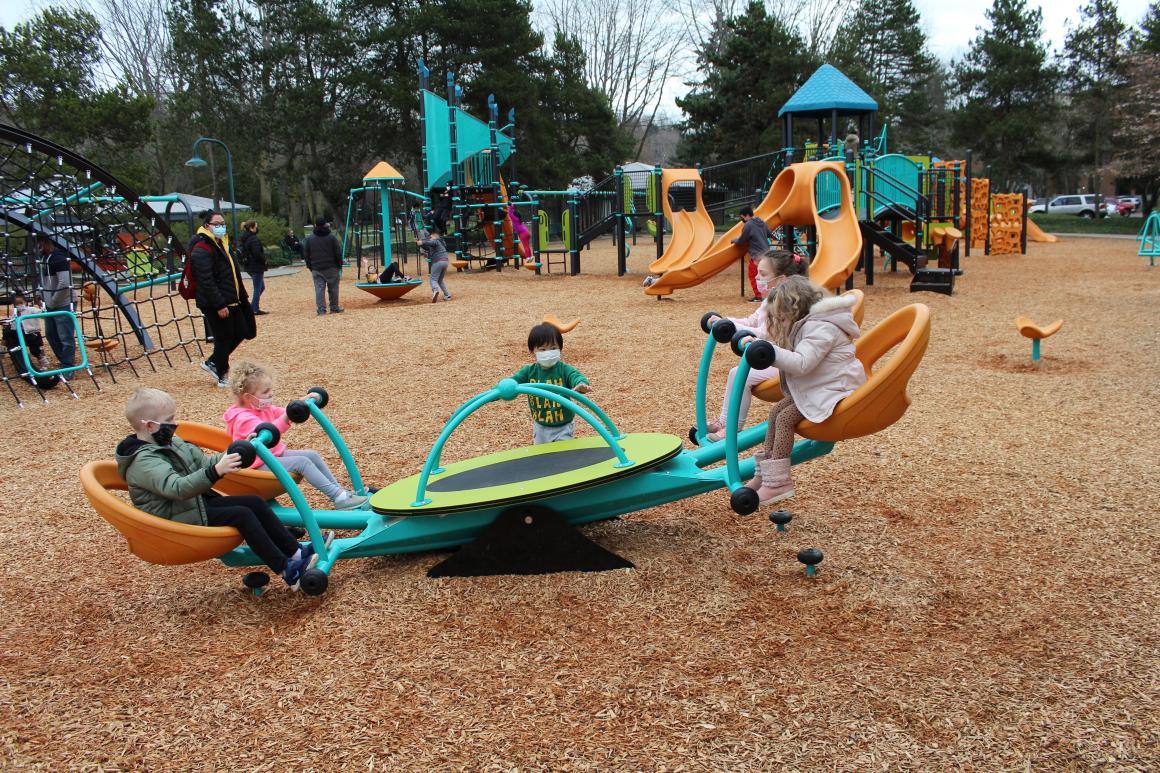 Modern, multi-kid seesaw teetertotter feature at new Gene Coulon playground in Renton near Seattle