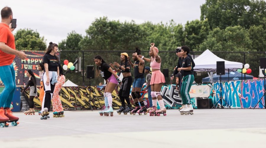 Roller skaters enjoy Juneteenth fun at NAAM's annual celebration.