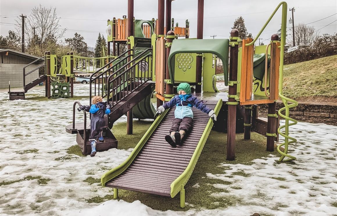 Lakeridge Playfield’s new playground features a roller slide that makes your voice warble if you talk while sliding down