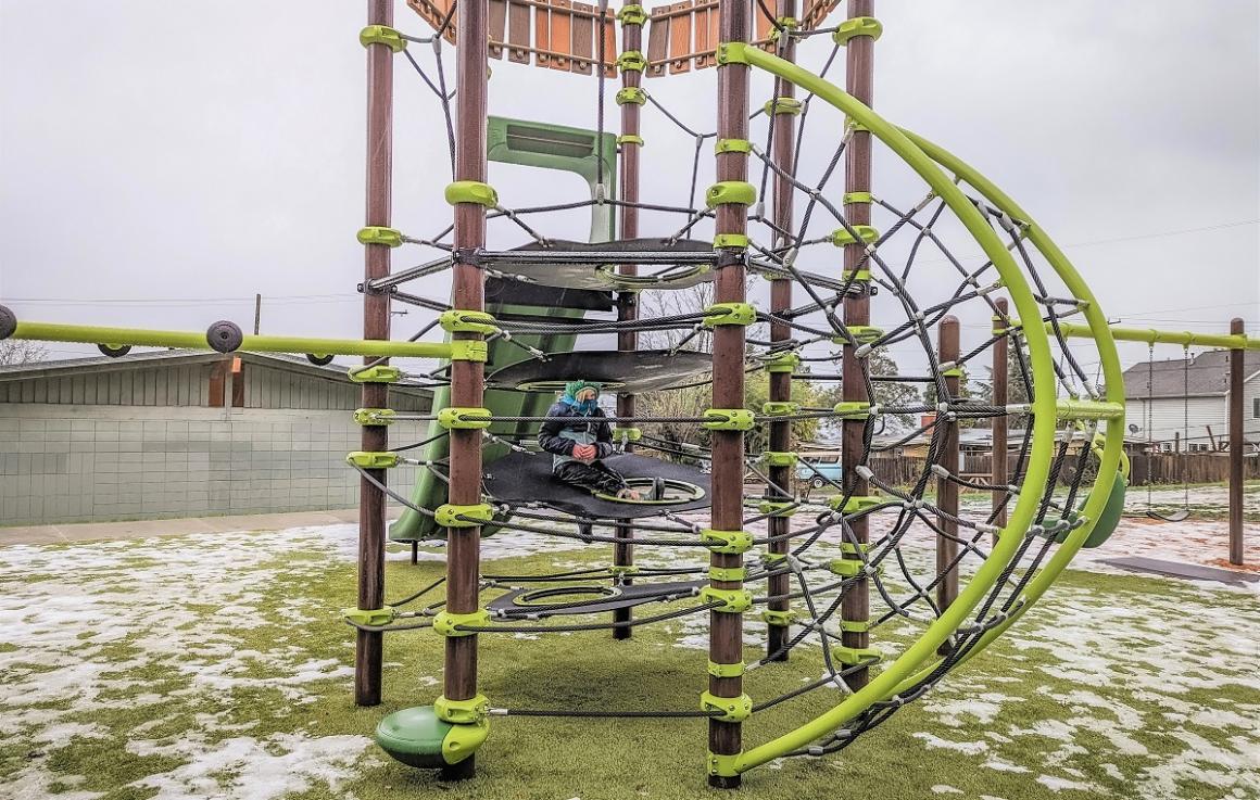 New Lakeridge Playground’s new cargo rope climber among three different play structures