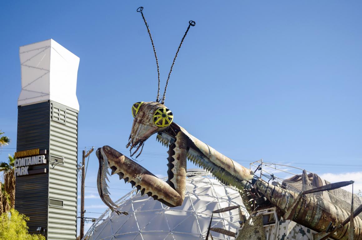 Gian praying mantis scultpure found at Downtown Container Park in Las Vegas among this city’s fun stops for kids best sunny destinations one flight from Seattle