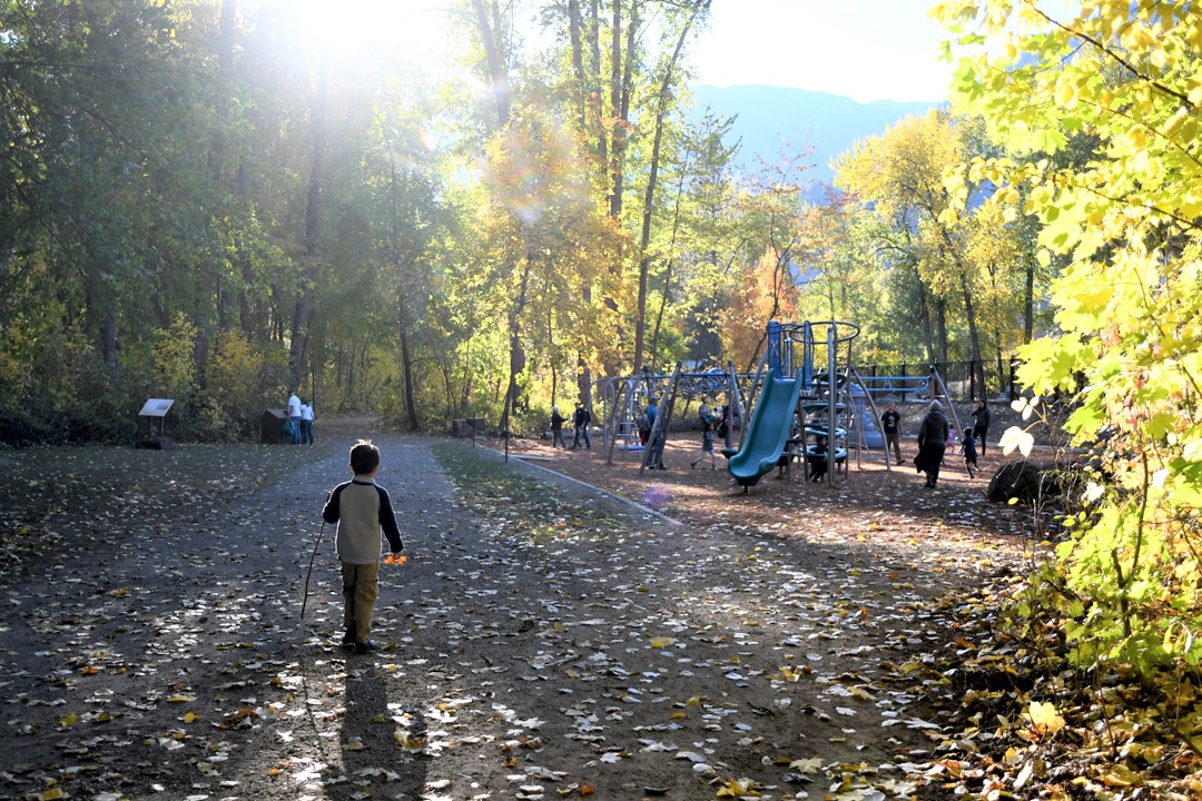 Kids playing at the playground at Enchantment Park in Leavenworth, Wash., mountain getaway for Seattle area families