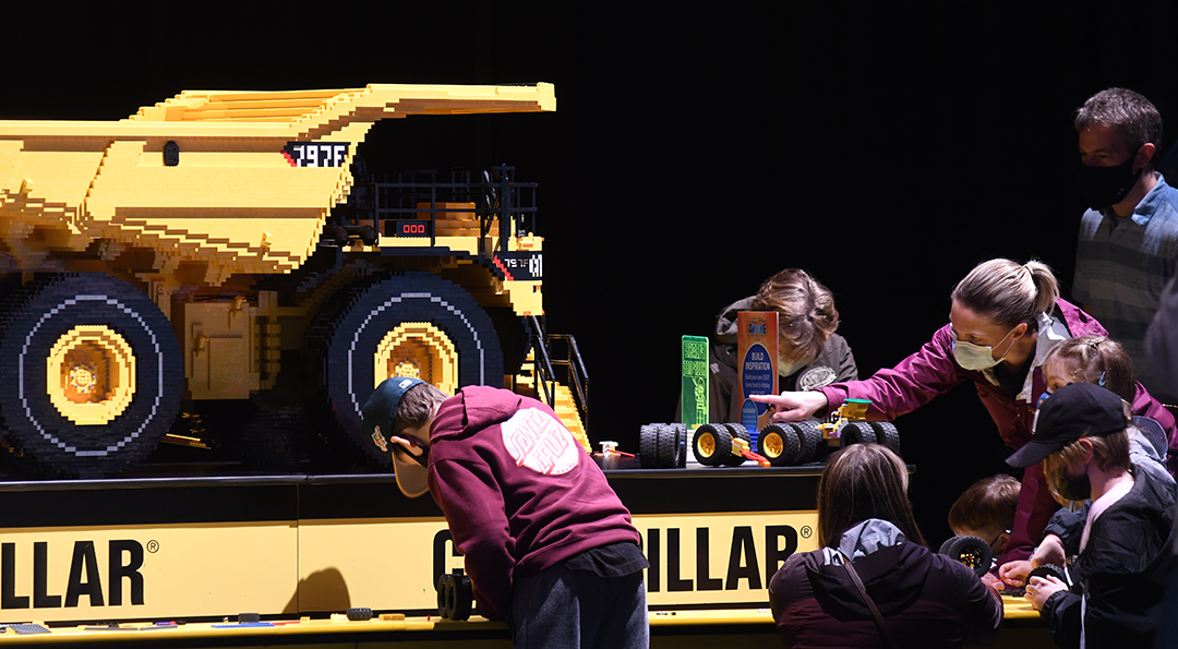 Caterpillar mining dump truck model on display at Awesome Exhibition The Interactive Exhibition of Lego Models at Seattle Center Fisher Pavilion