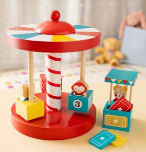A merry go round top with colorful characters is a great christmas gift idea